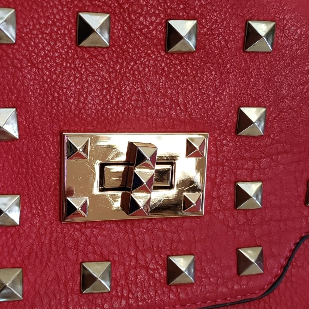 RED studded-embellished lipstick red vegan leather shoulder bag